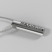 Side view of oval sterling silver TEXAS A&M pendant on chain